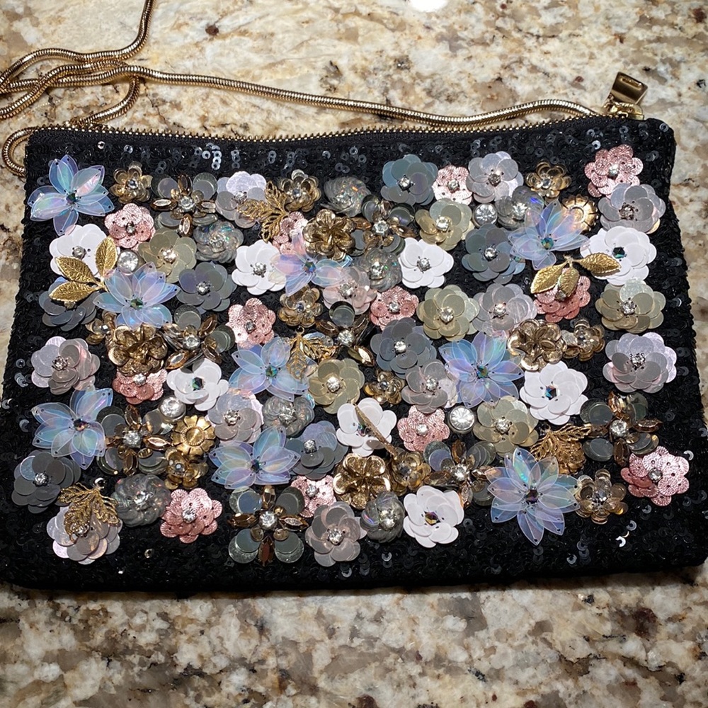 Steve Madden black clutch purse with flower sequin front and black velvet back.
